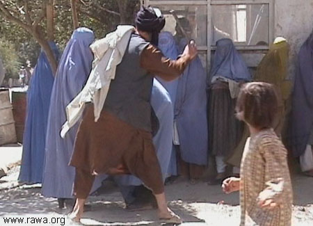 Taliban beat a woman in Kabul Sep.2001